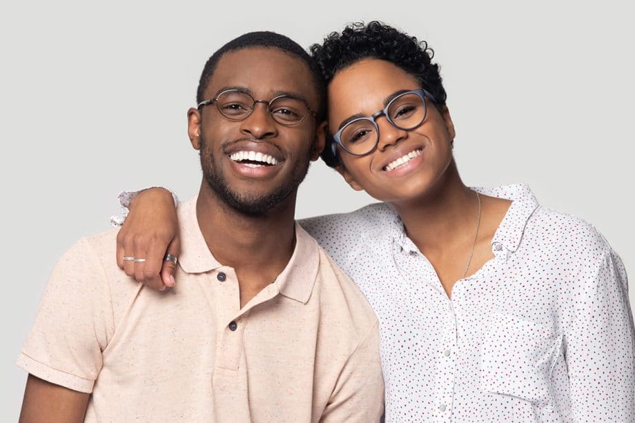 a happy couple showing their smiles